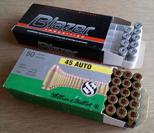 Boxes of .45 ACP cartridges: Sellier & Bellot and Blazer.