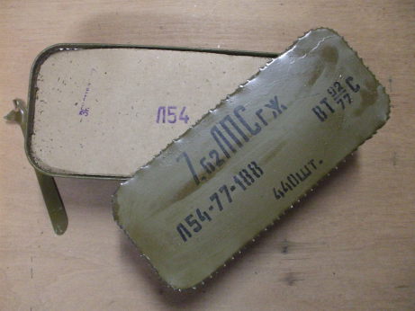 Freshly opened 'Spam Can' of Russian military surplus 7.62x54mmR ammunition. Cardboard layer on top of the ammunition packs.