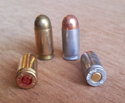9x18mm pistol ammunition cartridges. Aluminum cases from Bear and brass cases with lacquered primers from Sellier & Bellot.