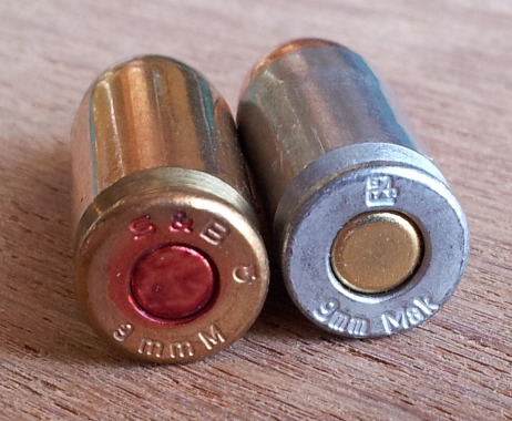9x18mm pistol ammunition cartridges. Aluminum cases from Bear and brass cases with lacquered primers from Sellier & Bellot.