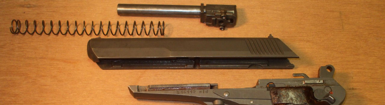 Field strip the ČZ-52 pistol into its major components for cleaning.