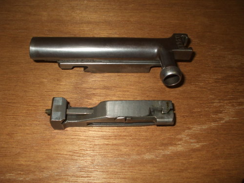 Separate the bolt and the bolt carrier.