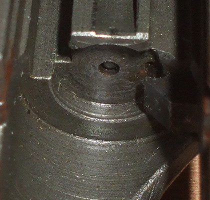 ČZ-52 slide, lying upside down. The firing pin is in good shape, and is back within the slide.