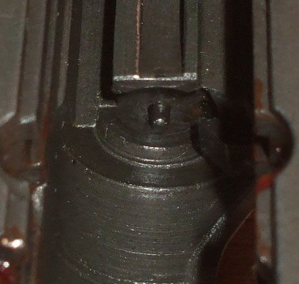 ČZ-52 slide, lying upside down. The firing pin is protruding from the rear face! This gun will fire on its own!