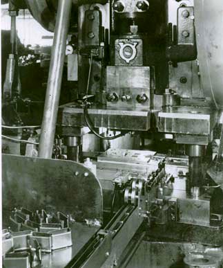 Stamping M1 en-bloc clips at Springfield Armory.