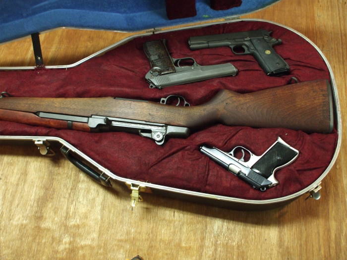 Open custom gun case with M1 Garand, FEG PA-63,  Česká Zbrojovka vzor 52, and Norinco M1911A1.  Closer view.