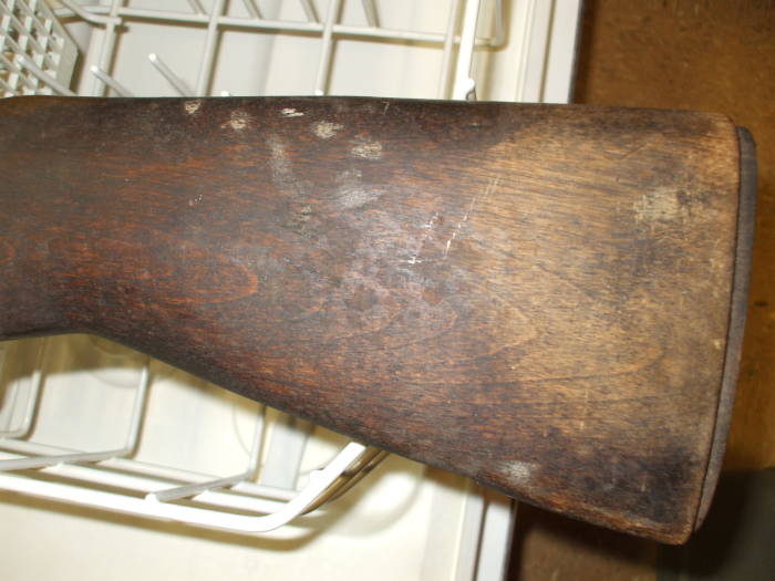Dishwasher cleaning of an M1 Garand rifle stock. Lighter wood before cleaning.