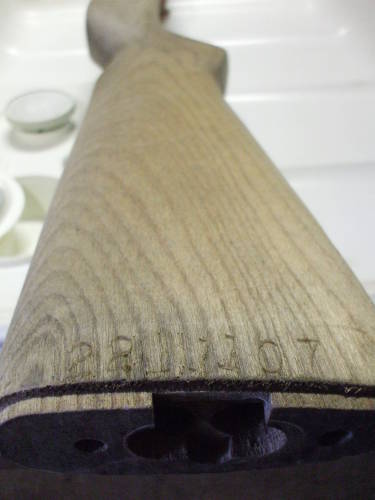 Dishwasher cleaning of an M1 Garand rifle stock. Light wood after cleaning.
