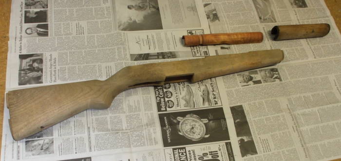 Preparing to stain an M1 Garand stock — main stock, rear handguard, front handguard.  All are now bare wood.